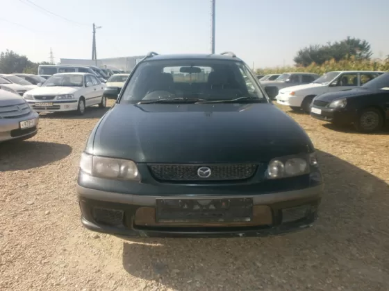 Купить Mazda Capella 1800 см3 АКПП (125 л.с.) Бензин инжектор в Усть-Лабинск: цвет Зеленый Универсал 1998 года по цене 160000 рублей, объявление №1723 на сайте Авторынок23