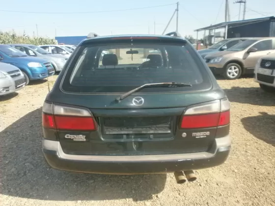 Купить Mazda Capella 1800 см3 АКПП (125 л.с.) Бензин инжектор в Усть-Лабинск: цвет Зеленый Универсал 1998 года по цене 160000 рублей, объявление №1723 на сайте Авторынок23