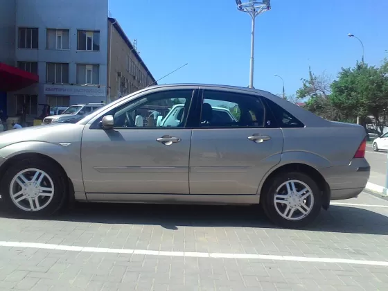 Купить Ford Focus 2000 см3 АКПП (130 л.с.) Бензиновый в Краснодар: цвет Серо-золотистый Седан 2003 года по цене 240000 рублей, объявление №4094 на сайте Авторынок23