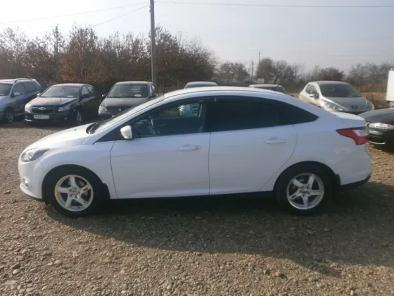 Купить Ford Focus 1600 см3 АКПП (125 л.с.) Бензин инжектор в Усть-Лабинск: цвет белый Седан 2012 года по цене 615000 рублей, объявление №2752 на сайте Авторынок23