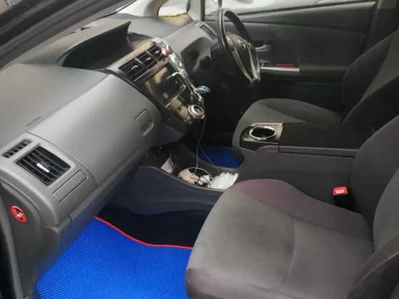 Купить Toyota Prius Alpha 1800 см3 АКПП (99 л.с.) Гибридный бензиновый в Краснодар: цвет черный Универсал 2014 года по цене 980000 рублей, объявление №21057 на сайте Авторынок23