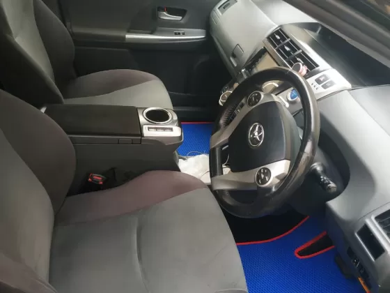 Купить Toyota Prius Alpha 1800 см3 АКПП (99 л.с.) Гибридный бензиновый в Краснодар: цвет черный Универсал 2014 года по цене 980000 рублей, объявление №21057 на сайте Авторынок23