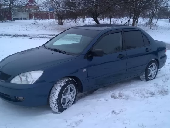 Купить Mitsubishi ланцер 1300 см3 МКПП (85 л.с.) Бензин инжектор в Тбилисская: цвет синий Седан 2007 года по цене 260000 рублей, объявление №18878 на сайте Авторынок23