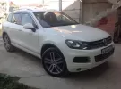 Купить Volkswagen Туарег 3600 см3 АКПП (249 л.с.) Бензин инжектор в Краснодар: цвет белый Внедорожник 2011 года по цене 1800000 рублей, объявление №1671 на сайте Авторынок23