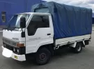 Купить Toyota Toyo Ace 4600 см3 МКПП (130 л.с.) Дизельный в Тбилисская: цвет Белый Бортовой 2001 года по цене 177000 рублей, объявление №22702 на сайте Авторынок23
