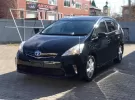 Купить Toyota Prius Alpha 1800 см3 АКПП (99 л.с.) Гибридный бензиновый в Краснодар: цвет черный Универсал 2014 года по цене 980000 рублей, объявление №21057 на сайте Авторынок23