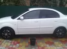 Купить KIA Rio 1400 см3 АКПП (95 л.с.) Бензин инжектор в Приморско-Ахтарск: цвет белый Седан 2011 года по цене 420000 рублей, объявление №15979 на сайте Авторынок23