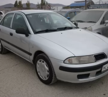 Купить Mitsubishi Carisma 1600 см3 МКПП (100 л.с.) Бензиновый в Новороссийск: цвет белый Седан 2001 года по цене 235000 рублей, объявление №252 на сайте Авторынок23 Купить Mitsubishi Carisma 1600 см3 МКПП (100 л.с.) Бензиновый в Новороссийск: цвет белый Седан 2001 года по цене 235000 рублей, объявление №252 на сайте Авторынок23