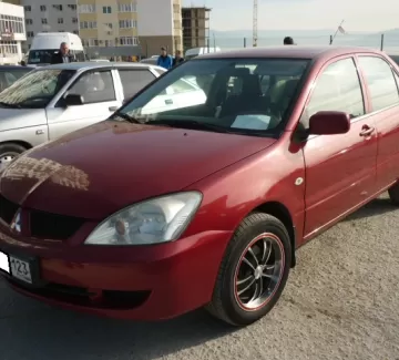 Купить Mitsubishi Lancer 2009 АКПП (107 л.с.) Бензиновый Новороссийск цвет красный Седан 2009 года по цене 360000 рублей, объявление №474 на сайте Авторынок23 Купить Mitsubishi Lancer 2009 АКПП (107 л.с.) Бензиновый Новороссийск цвет красный Седан 2009 года по цене 360000 рублей, объявление №474 на сайте Авторынок23