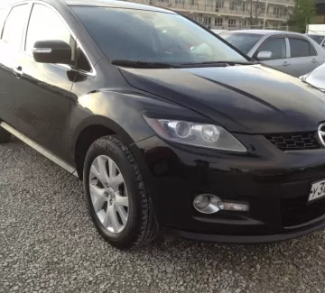 Купить Mazda CX-7: 2300 см3 АКПП (238 л.с.) Бензин турбонаддув в Новороссийск: цвет черный металлик Внедорожник 2007 года по цене 660000 рублей, объявление №1182 на сайте Авторынок23 Купить Mazda CX-7: 2300 см3 АКПП (238 л.с.) Бензин турбонаддув в Новороссийск: цвет черный металлик Внедорожник 2007 года по цене 660000 рублей, объявление №1182 на сайте Авторынок23