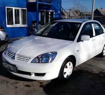 Купить Mitsubishi Lancer 1500 см3 АКПП (102 л.с.) Бензиновый в Краснодар: цвет Белый Седан 2008 года по цене 345000 рублей, объявление №153 на сайте Авторынок23 Купить Mitsubishi Lancer 1500 см3 АКПП (102 л.с.) Бензиновый в Краснодар: цвет Белый Седан 2008 года по цене 345000 рублей, объявление №153 на сайте Авторынок23