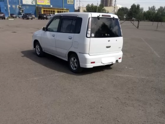 Купить Nissan Cube 1300 см3 CVT (85 л.с.) Бензин инжектор в Крымск: цвет Белый Хетчбэк 2000 года по цене 470000 рублей, объявление №25255 на сайте Авторынок23